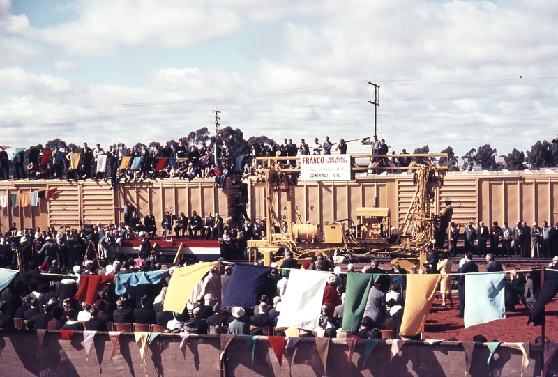 109464: Kalgoorlie Crowd gathered for driving of last spike on SG Line Laying of last rails.