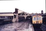 111091: BR Aberystwyth CGN DMU to Pwllheli Narrow gauge stock at left
