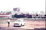 111527: Kampala Uganda Locomotive Depot Shunter 3122 Batwa City Skyline in Background