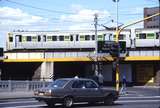 115526: Port Melbourne Line at Queens Bridge Up Suburban 4-car Rebuilt Harris 904 M 3504 T leading