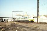 116185: Port Melbourne Line at St Kilda Line Divergence Up Suburban 4-car Rebuilt Harris 905 M leading