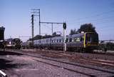 119560: Spotswood Anzac Siding Up Suburban 6-car Comeng 310 M trailing and National Rail Shunter 4910