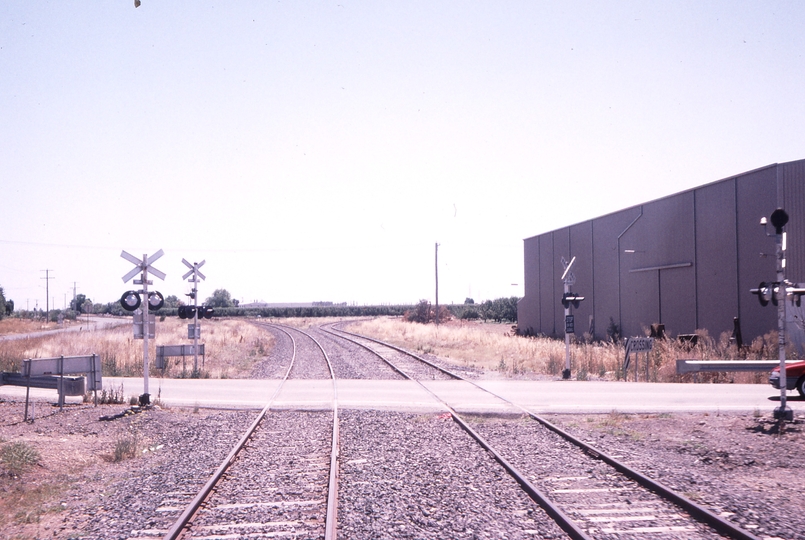 119660: km 185.377 Grahamvale Road Level Crossing Looking North Dookie Line diverging on right