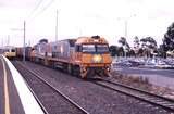 123094: Hoppers Crossing Up Suburban 6-car Comeng and 9702 Up Superfreighter NR 81 NR 89