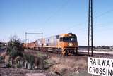 123680: Maddox Road Level Crossing 9821 NP 2 Down Steel train NR 77 NR 75