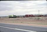 124176: Stuart Highway Level Crossing km 1292 5 Narrow Gauge Central Australia Railway 10:00am Southbound Passenger DH 14
