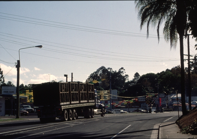 127144: Nambour Mill Howard Street East end Road Vehicle carrying loaded cane bins
