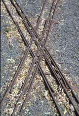 129559: Traralgon Miniature Railway 127 mm and 184 mm dual gauge diamond crossing