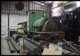 129975: Belgrave Locomotive Workshop Peckett Carbon and in background DH 59