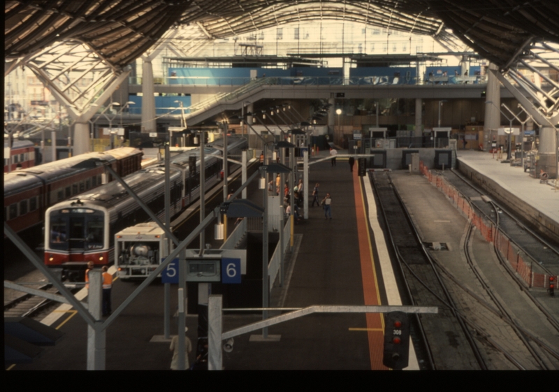 130664: Southern Cross Platforms 5 and 6 looking South from Bourke Street escalators