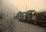131438: Arthurs Pass Coal Train to Lyttelton DX 5477 DXB 5229 Bank Locomotives in distance