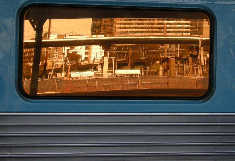 135589: Southern Cross Platform 1 Reflection in XPT Carriage window