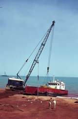 400109: Groote Eylandt NT BHP site Milner Bay unloading D9 from barge 'Hawk'