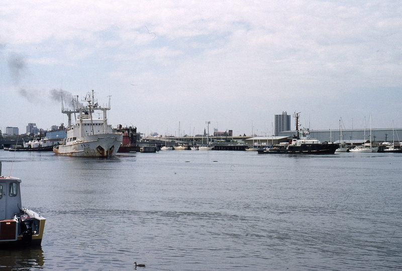 400631: Yarra downstream from Charles Grimes Bridge Chinese Tug preparing to take A J Wagglen dock for voyage to Chine (later lost at sea), Photo Michael Venn