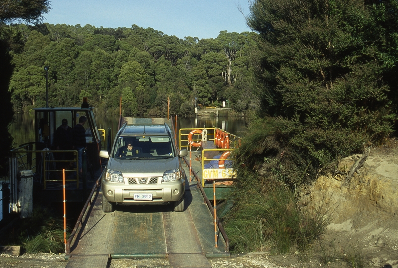 401026: Corinna Tasmania Road vehicle moving off North bank of Pieman River