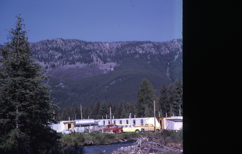 401294: CPR Survey Camp Fording River BC Canada Ewin Creek in foreground