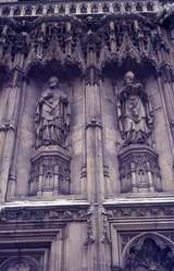 401337: Canterbury Kent England Statues of Anselm (left), and Thomas Cramner (right), on wall of Canterbury Cathedral